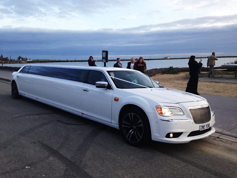 White Chrysler 12 seater limo hire